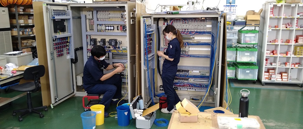 Female worker landscape control panel